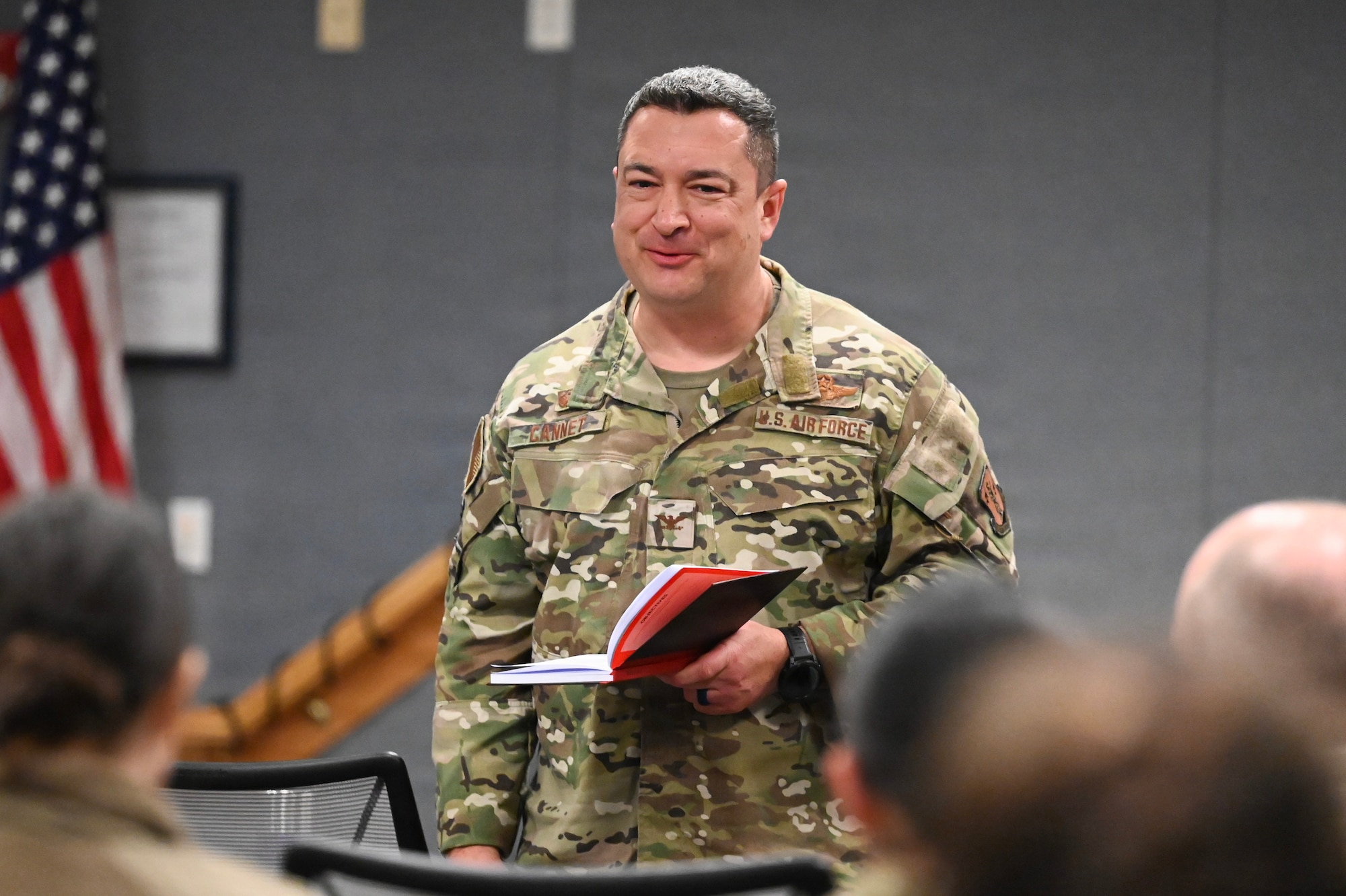 U.S. Air Force Colonel Jeffrey Cannet, 106th Rescue Wing commander, speaks with Airmen from the 106th Medical Group during a town hall meeting on Francis S. Gabreski Air National Guard Base, Westhampton Beach, N.Y., March 7, 2026. Senior leadership held town hall meetings with wing members to discuss topics from the Defense Organizational Climate Survey. (U.S. Air National Guard photo by Staff Sgt. Sarah McKernan)