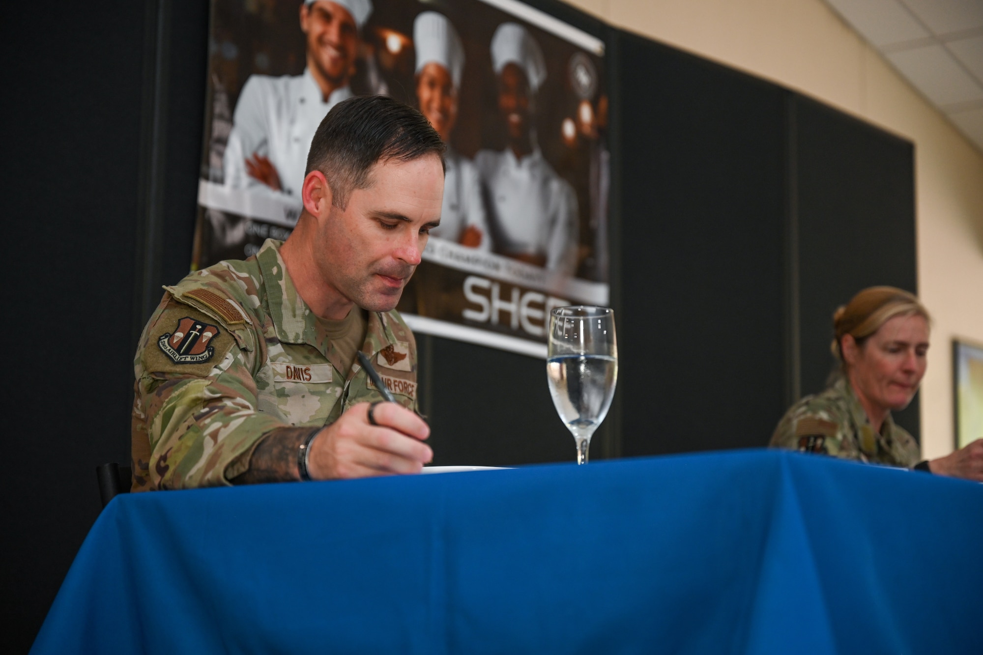 Man sits at a table.