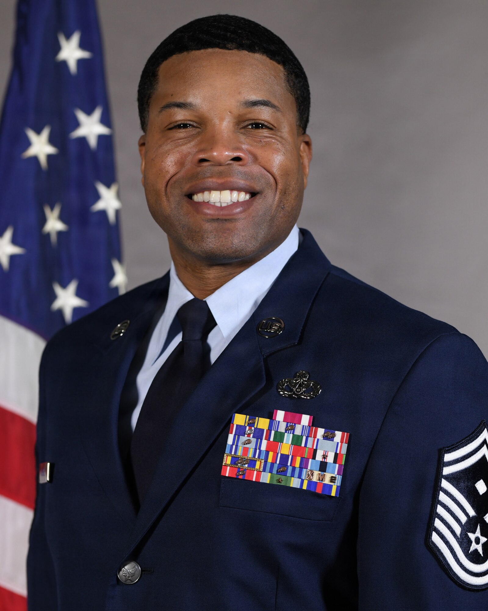 U.S. Air Force Senior Master Sgt. John McGhee, a first sergeant assigned to the New York Air National Guard, 106th Rescue Wing, poses for an official photo at Francis S. Gabreski Air National Guard Base, Westhampton Beach, New York, Jan. 08, 2026. Senior Master Sgt. McGhee has been selected as the New York State First Sergeant of the Year for 2026.