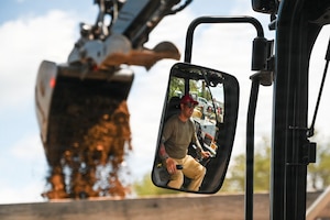 U.S. Air National Guard Tech Sgt. Tyler Austin, assigned to the 111th Attack Wing’s 201st RED HORSE Squadron, Detachment 1, operates heavy equipment during a paving project at Tobyhanna Army Depot, Pa., June 17, 2026. The project provided Airmen valuable equipment operating time and real-world experience while completing pavement construction requirements at the depot. (U.S. Air National Guard photo by Senior Airman Matthew Bergh)