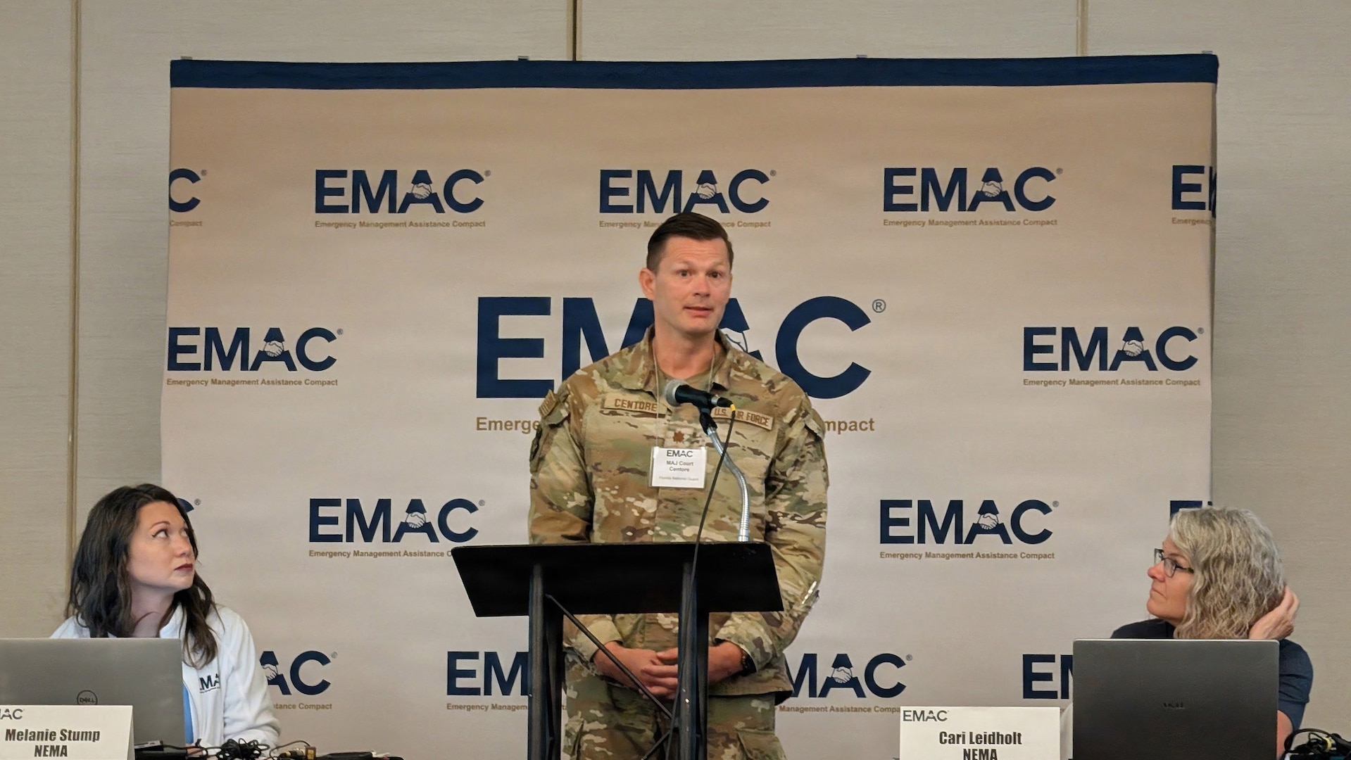 Maj. Court Centore, an Airman in the Florida National Guard, speaks during the EMAC Coordinator and National Guard Workshop in Indianapolis Aug. 12-13.