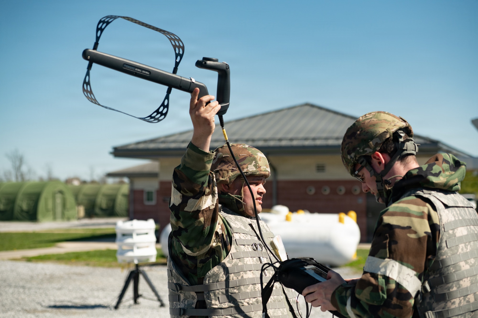 U.S. Air Force Tech. Sgt. Christopher Peluso, left, and Senior Airman Warren Planker, both assigned to the Pennsylvania Air National Guard’s 111th Attack Wing, 270th Engineering Installation Squadron, operate radio frequency direction-finding equipment during a combat readiness exercise at Fort Indiantown Gap, Pennsylvania, April 11, 2026. The Airmen used specialized equipment to analyze and locate RF signals while practicing techniques designed to support operations in a field environment. (U.S. Air National Guard photo by Senior Airman Matthew Bergh)