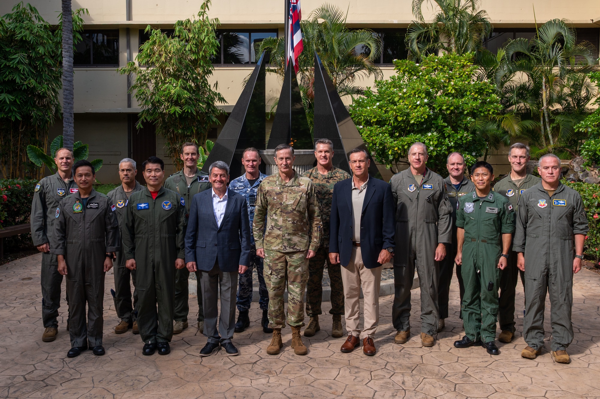 Military officers stand in a group