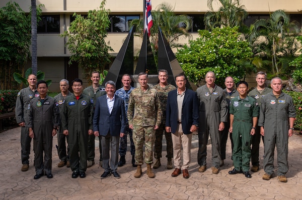 Military officers stand in a group