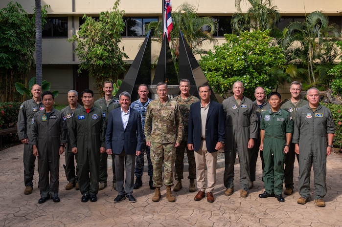 Military officers stand in a group