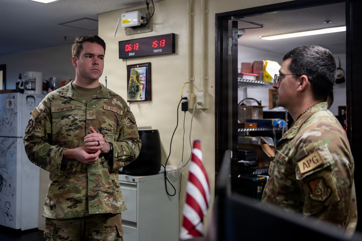 U.S. Air Force Tech. Sgt. Jeffrey Thompson, 35th Maintenance Squadron (MXS) transient alert section chief, receives a debrief from Master Sgt. Benjamin Israel 35th MXS wheel and tire section chief, on the shift turnover.