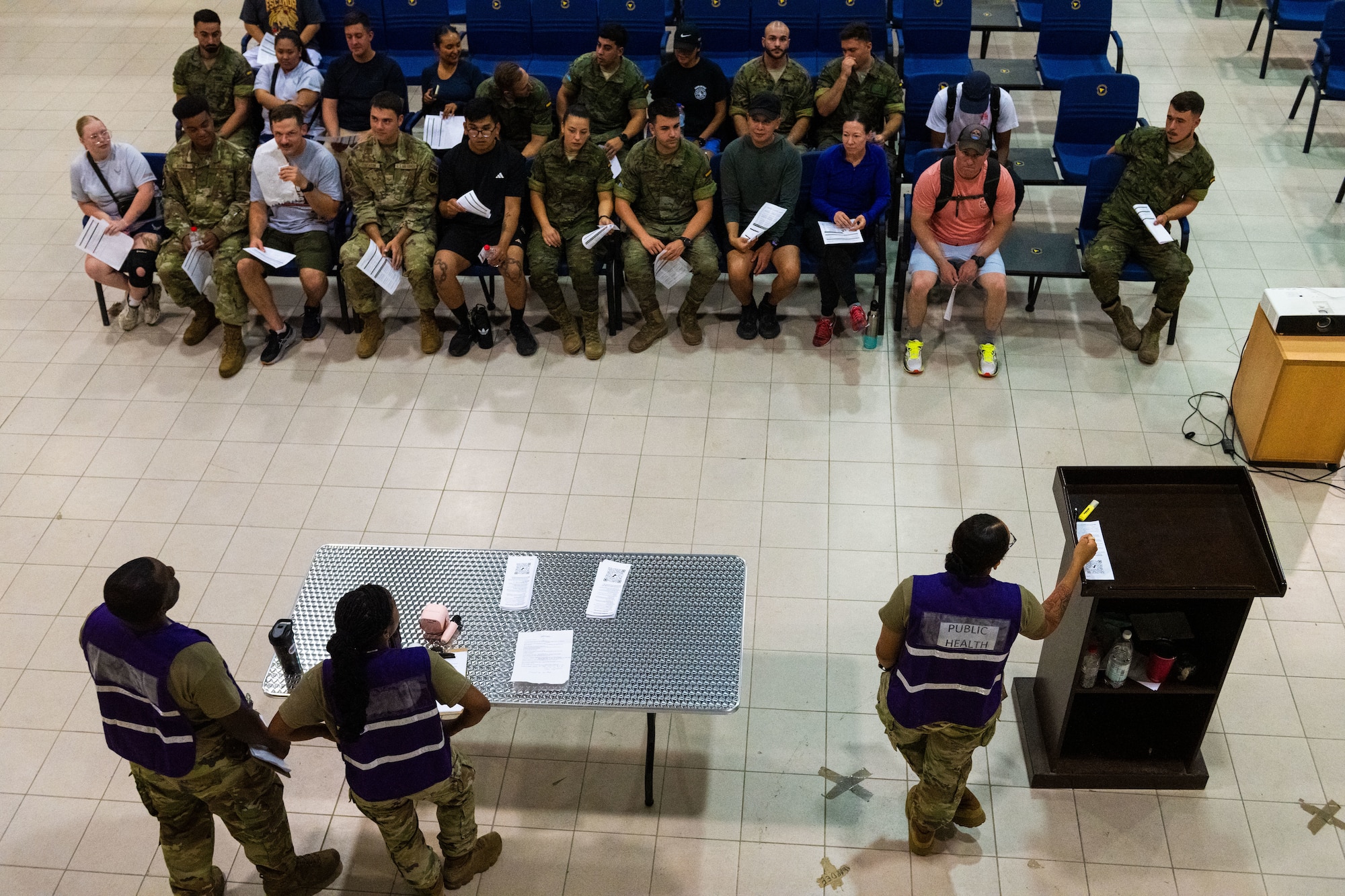 U.S. Airmen assigned to the 39th Medical Group brief participants.