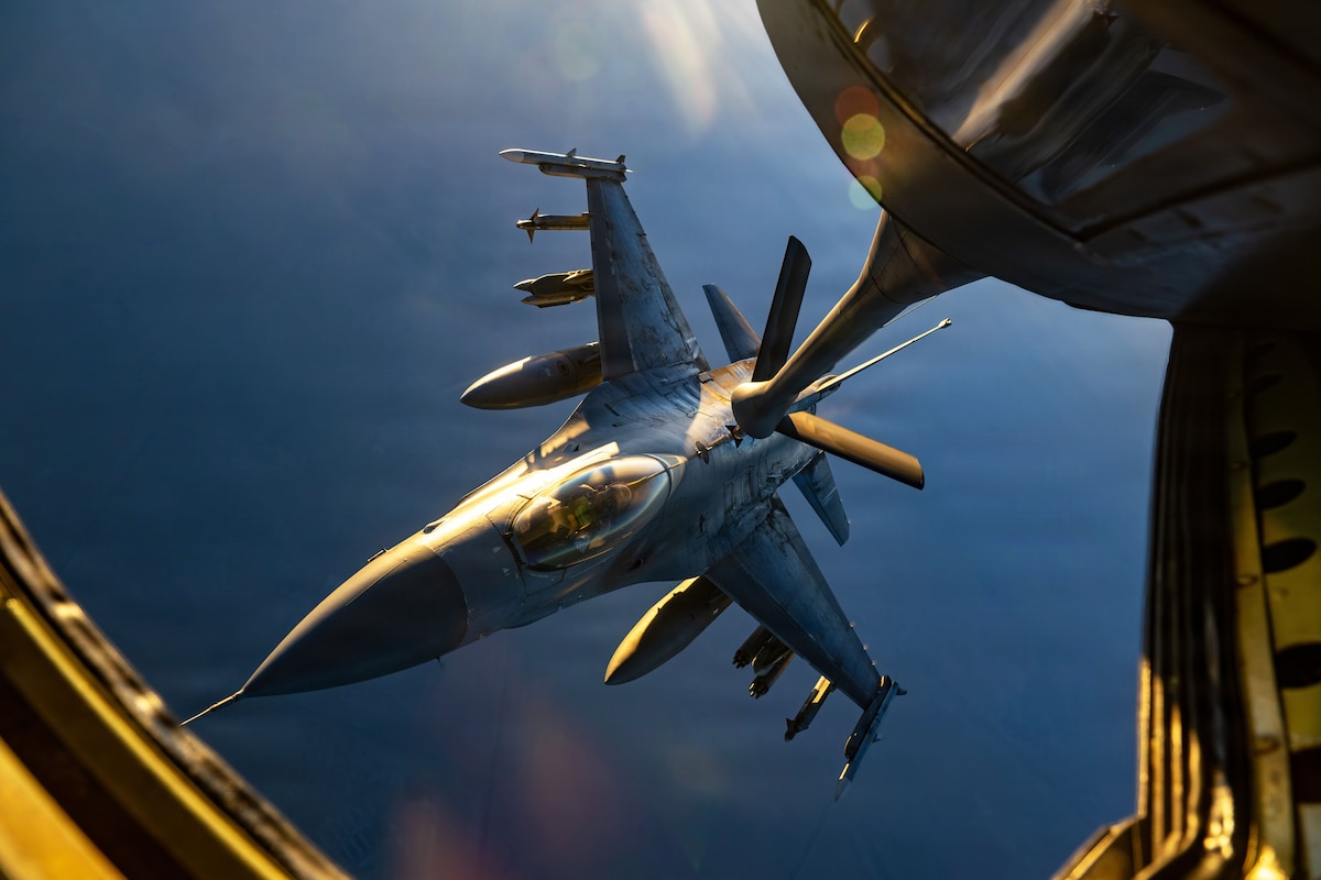 A U.S Air Force F-16 Fighting Falcon receives fuel from a KC-135 Stratotanker in the U.S. Central Command area of responsibility Aug. 7, 2026. Aerial refueling extends the range and endurance of combat aircraft supporting operations throughout the region. (U.S. Air Force photo by Master Sgt. James K. Thomas)