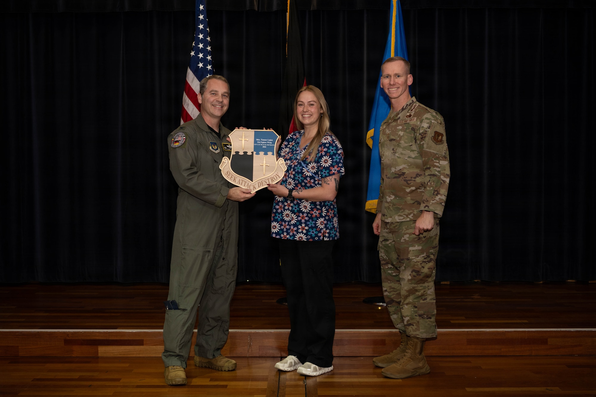 Person receives award.