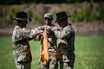 Maj. Paul Marcinko and Sgt. Maj. Lawrence McGrogan case the colors of the Portsmouth-based 2nd Squadron, 183rd Cavalry Regiment, 116th Mobile Brigade Combat Team, during the squadron’s inactivation ceremony Aug. 13, 2026, at Fort Pickett, Virginia. The casing of the colors marked the formal conclusion of the squadron’s service as generations of troopers gathered to honor its history, traditions and esprit de corps. The squadron’s inactivation is part of the ongoing Army Transformation Initiative. (U.S. Army National Guard photo by Sgt. 1st Class Terra C. Gatti)