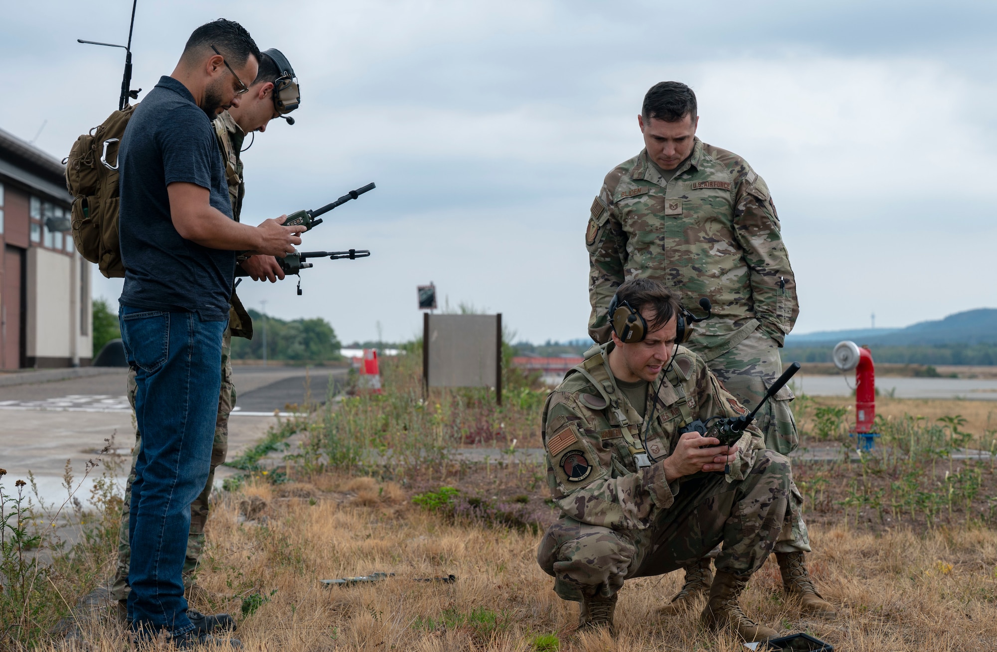 U.S. Air Force personnel assigned to the 86th Operations Support Squadron’s Radar, Airfield and Weather Systems flight conduct ground communications during an alternate landing zone exercise at Ramstein Air Base, Germany, Aug 18, 2026. U.S. Air Force personnel assigned to Ramstein Air Base participated in a training, which focused on a C130J Super Hercules aircraft landing and taking off from austere locations. (U.S. Air Force photo by Staff Sgt. Sabrina Fuller-Judd)