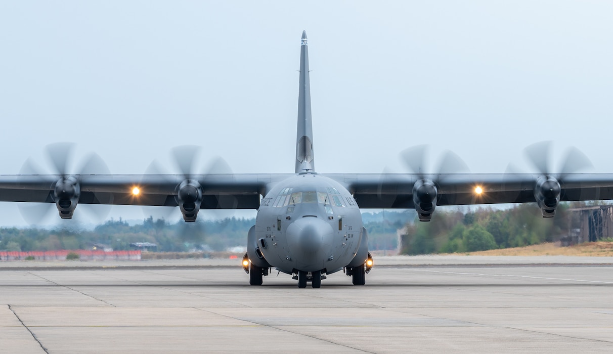A U.S. Air Force C-130J Super Hercules aircraft lands on a taxiway during an alternate landing zone exercise at Ramstein Air Base, Germany, Aug. 18, 2026. The landing marked the first-time an airplane used a Ramstein taxiway as an alternate landing zone. (U.S. Air Force photo by Senior Airman Jared Lovett)
