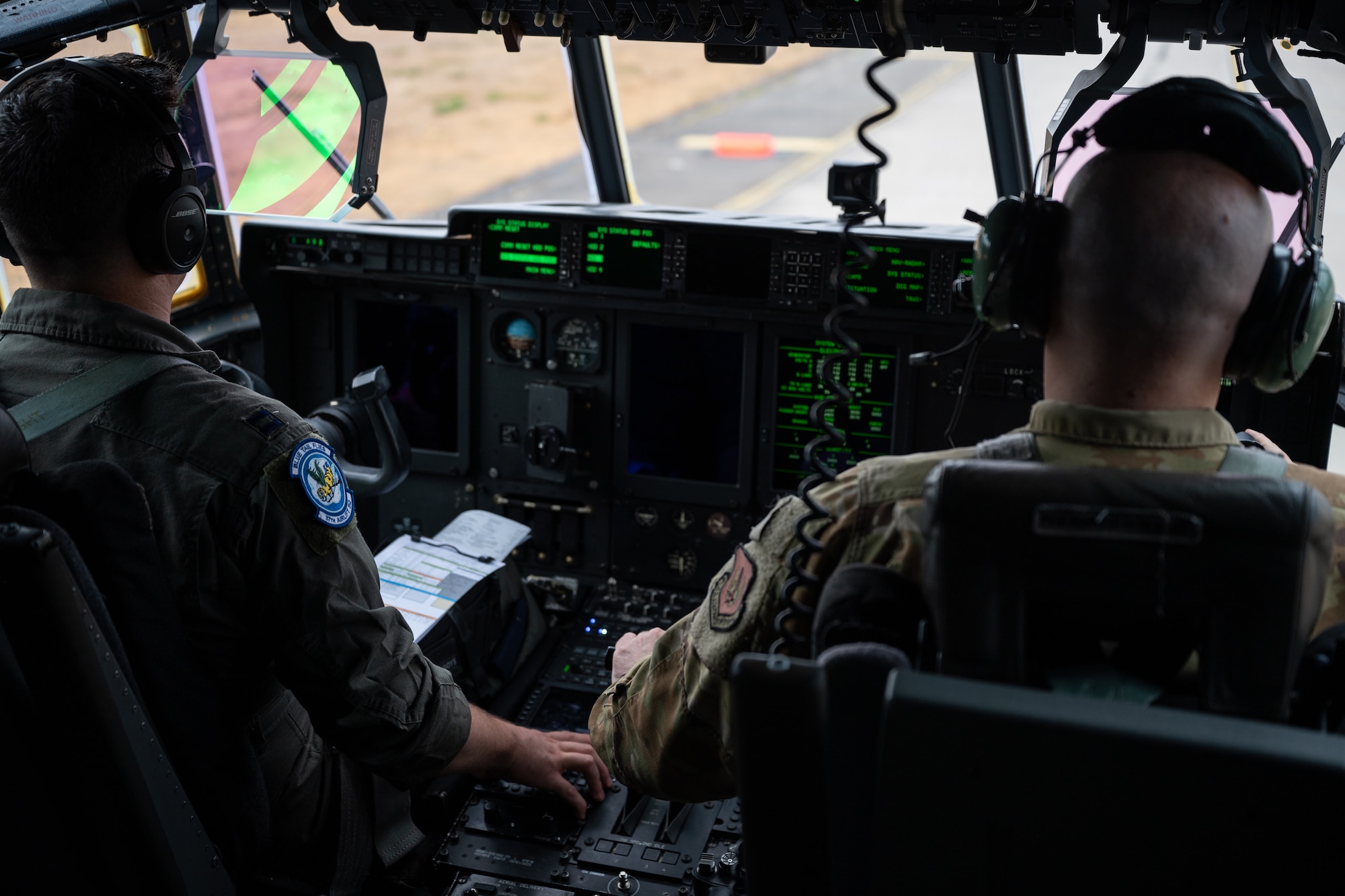 U.S. Air Force Capt. Christopher Galemore, left, 37th Airlift Squadron Chief of Tactics, and Maj. Riley Miller, 37th AS Chief Pilot, prepare to land a C-130J Super Hercules on an alternate landing zone at Ramstein Air Base, Germany, Aug. 18, 2026. The historic landing marked the first time a C-130J used an alternate landing zone at Ramstein, demonstrating an additional option for sustaining tactical airlift operations from the installation. (U.S. Air Force photo by Senior Airman Edgar Grimaldo)