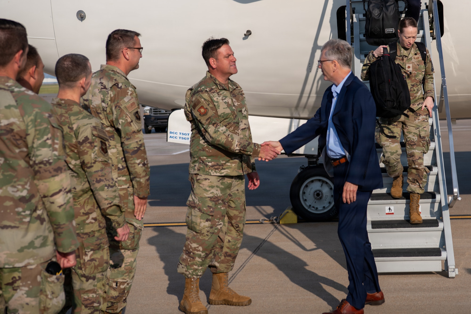 U.S. Air Force Col. Joseph D. Wall, 22nd Air Refueling Wing commander, welcomes Secretary of the Air Force Troy Meink to McConnell Air Force Base, Kansas, Aug. 12, 2026. Secretary Meink visited McConnell during a historic period as the 22nd Air Refueling Wing works toward completing its transition from the KC-135 Stratotanker to the KC-46A Pegasus. (U.S. Air Force photo by Airman Matthew Nguyen)