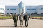Gen. Gregory Guillot, center, commander of the North American Aerospace Defense Command (NORAD) and U.S. Northern Command (USNORTHCOM), Royal Canadian Air Force Lt. Gen. Iain Huddleston, deputy commander of NORAD, and U.S. Air Force Gen. Adrian Spain, commander of Air Combat Command, pose for a photo at NORAD and USNORTHCOM headquarters on Peterson Space Force Base, Colorado, Aug. 18, 2026. The commanders met to begin the annual Warfighter Talks, an executive-level engagement focused on synchronizing force presentation, modernizing command and control systems, and enhancing combined readiness to defend North America. (Dept. of War photo by U.S. Air Force Staff Sgt. Colten Tessness)