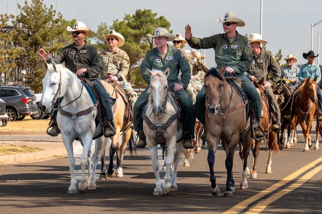 The 97th Air Mobility Wing command team rides in the 28th Annual Cattle Drive at Altus Air Force Base, Oklahoma, Aug. 20, 2026. Altus AFB has hosted the Cattle Drive since 1999. (U.S. Air Force photo by Senior Airman Kari Degraffenreed)