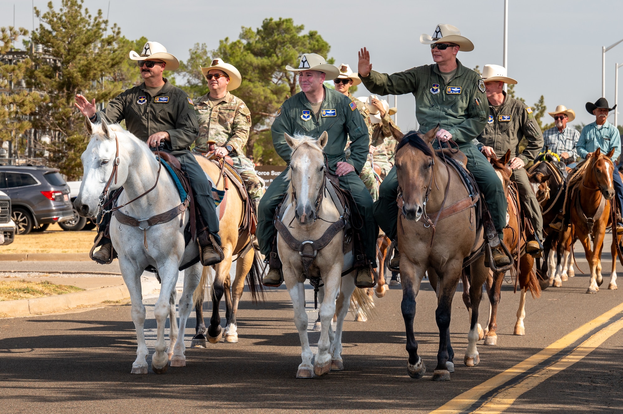The 97th Air Mobility Wing command team rides in the 28th Annual Cattle Drive at Altus Air Force Base, Oklahoma, Aug. 20, 2026. Altus AFB has hosted the Cattle Drive since 1999. (U.S. Air Force photo by Senior Airman Kari Degraffenreed)