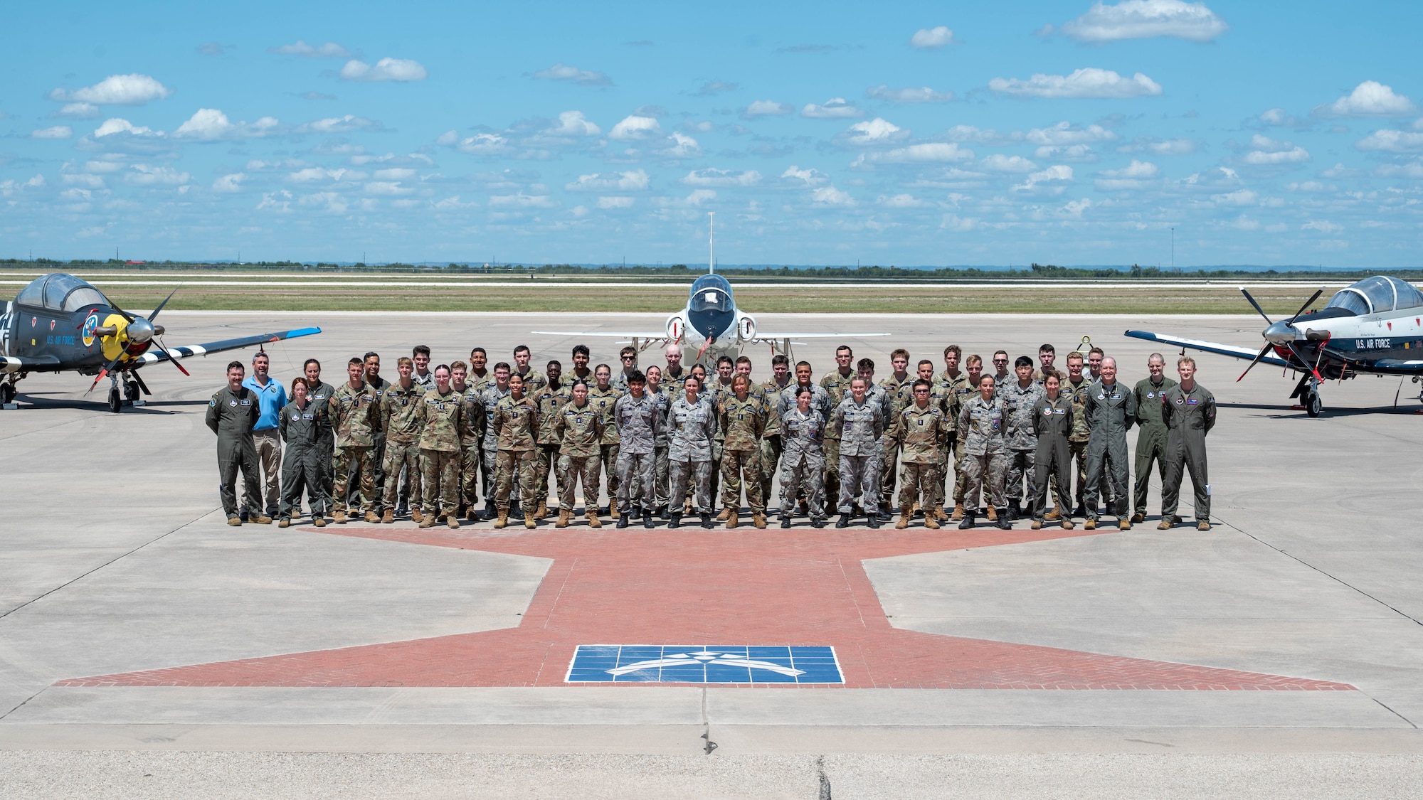 Civil Air Patrol cadets pose for a photo during their immersion at Laughlin Air Force Base, Texas, Aug. 11, 2026. Forty cadets from across the country were able to learn about the pilot training mission and the units that support that mission with tours, hands-on experience, and incentive flights. (U.S. Air Force photo by Senior Airman Jarrett Smith)