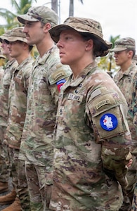 U.S. Army Sgt. 1st Class Gabrielle Hamelly, a graduate of the Jungle Operations Training Course-Panama, stands in formation during a graduation ceremony at Aeronaval Base Cristóbal Colón, Panama, July 3.