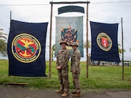 U.S. Army Sgt. 1st Class Gabrielle Hamelly and Spc. Aurora Pennington pose for a photo at Aeronaval Base Cristóbal Colón, Panama, July 3.