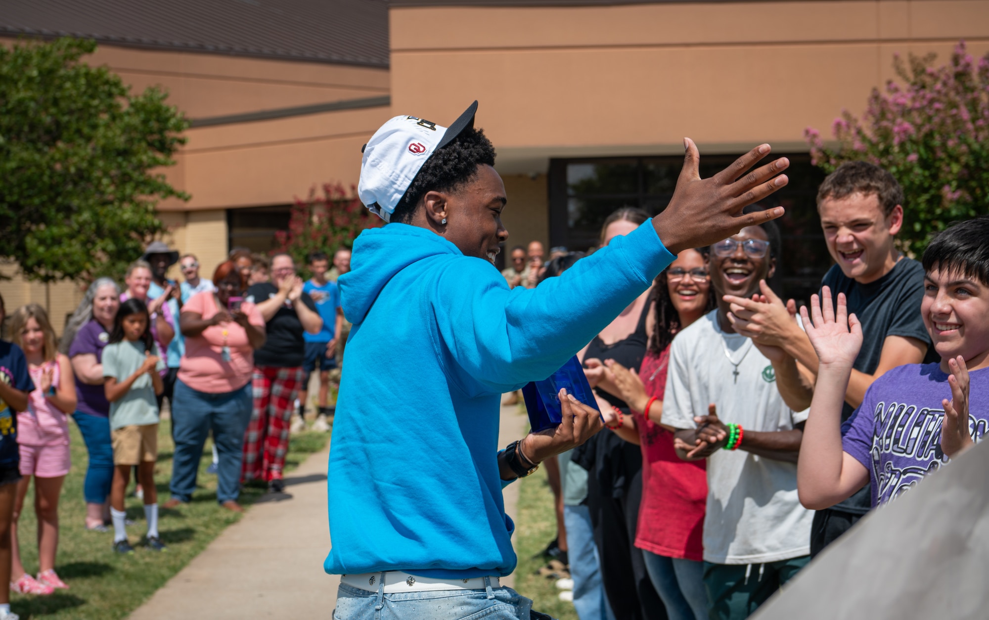 Youth receives congratulations