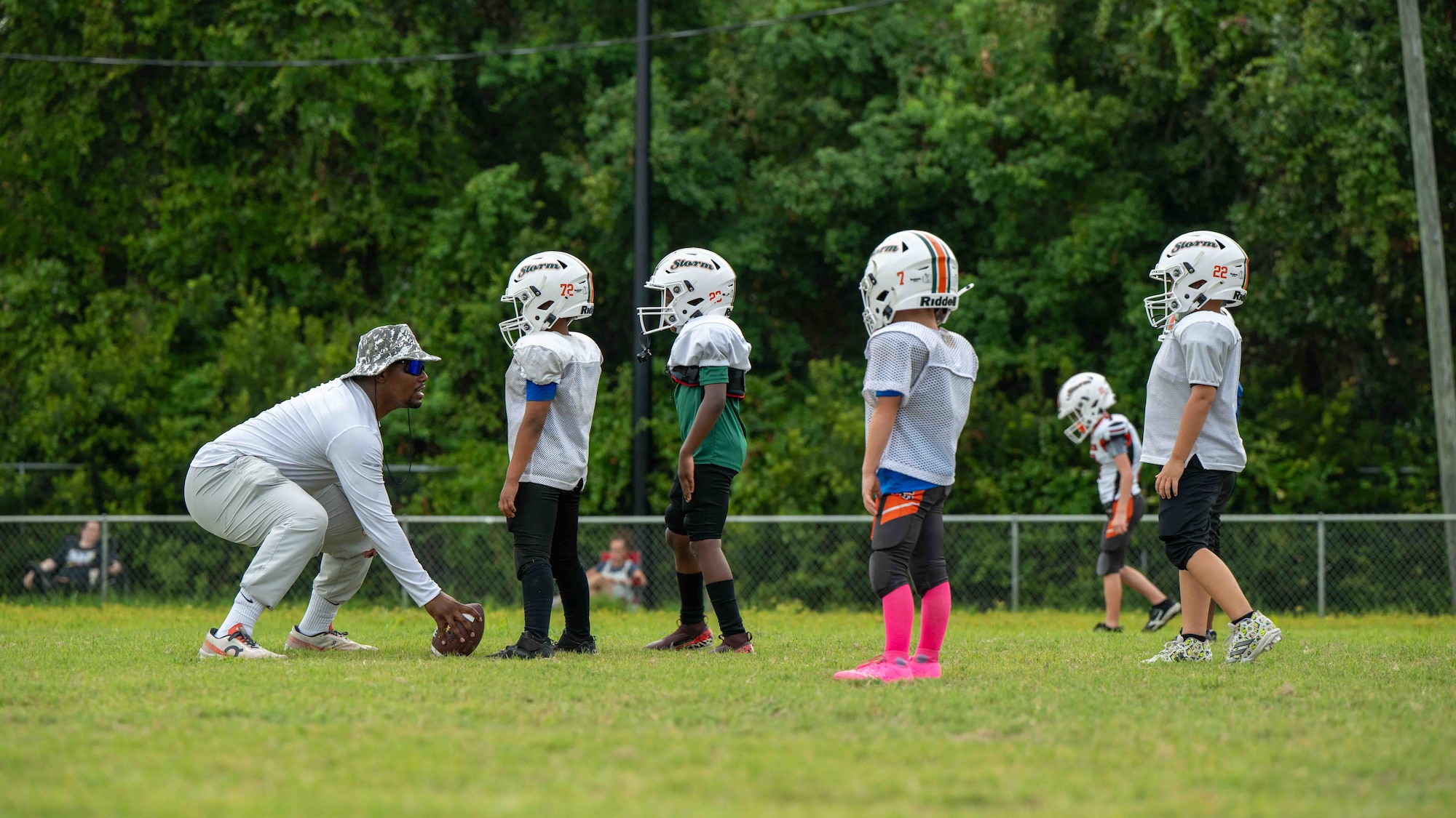 U.S. Air Force Senior Airman Vicen’te Thompkins, 337th Air Control Squadron weapons simulation technician, coaches a youth football team in Panama City, Florida, July 31, 2026.
