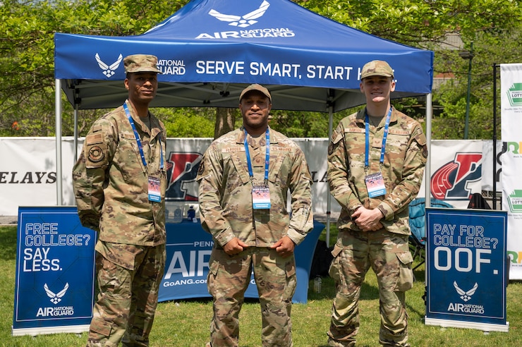 U.S. Air National Guard recruiters from the 111th Attack Wing man a table at the 2026 Penn Relays April 4 2026 in Philadelphia, Pennsylvania. The recruiters spoke with student athletes about opportunities with the Pennsylvania Air National Guard. (U.S. Air National Guard Photo by Senior Airman Matthew Bergh)