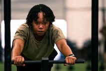Person pushes weight sled