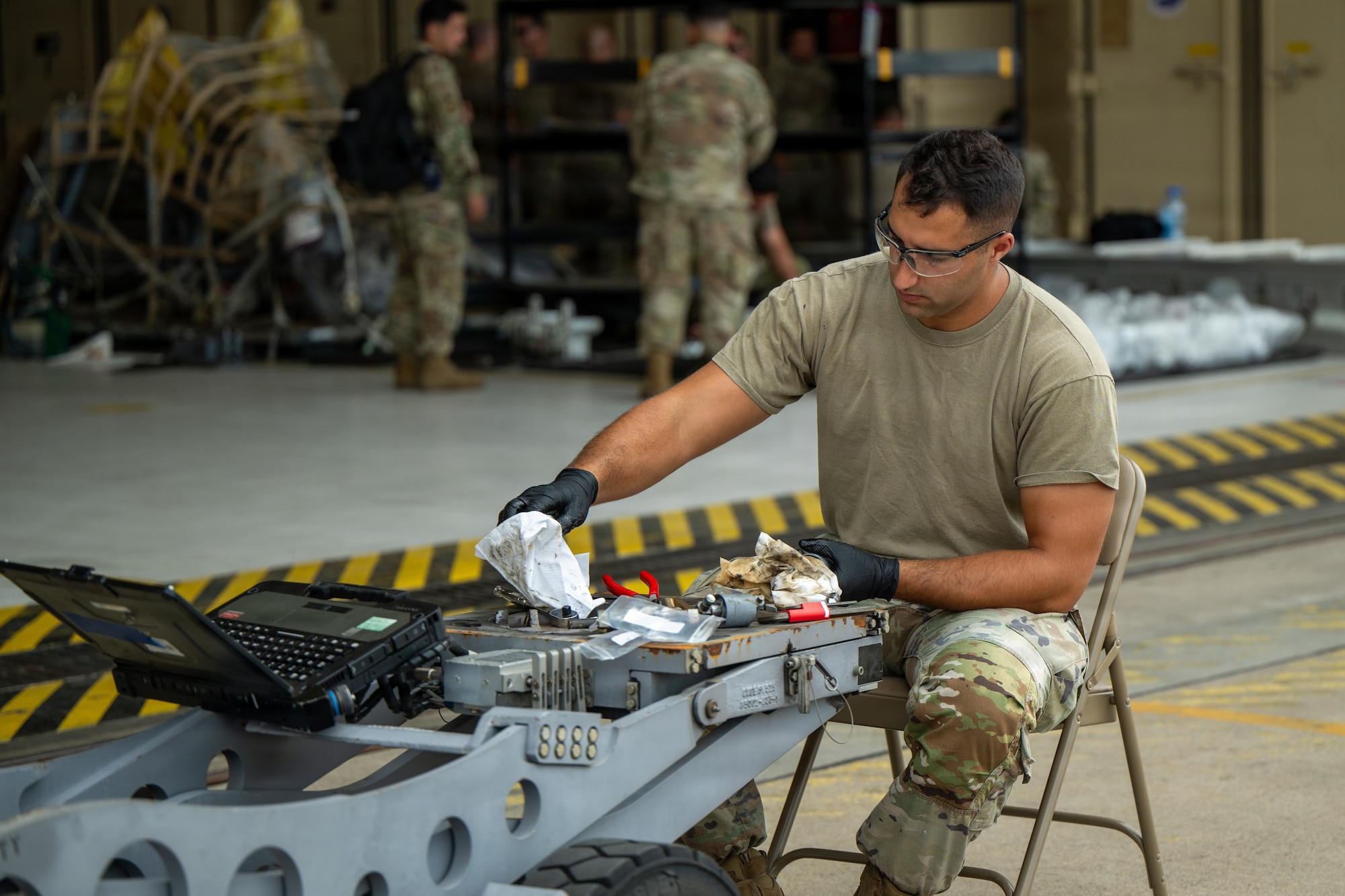 U.S. Air Force Staff Sgt. Malek Kharrat, 325th Maintenance Squadron aerospace ground equipment craftsmen, changes table cylinders during Weapons System Evaluation Program-Combat Hammer 26.07 at Hill Air Force Base, Utah, Aug. 12, 2026.