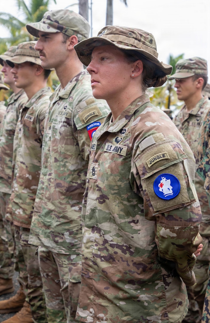 U.S. Army Sgt. 1st Class Gabrielle Hamelly, a graduate of the Jungle Operations Training Course-Panama, stands in formation during a graduation ceremony at Aeronaval Base Cristóbal Colón, Panama, July 3.