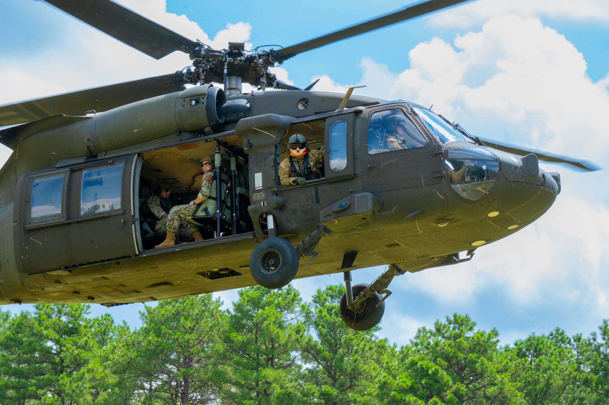 A U.S. Army UH-60 Blackhawk prepares to land during a training exercise at Joint Base McGuire-Dix-Lakehurst, N.J., Aug. 18, 2026.