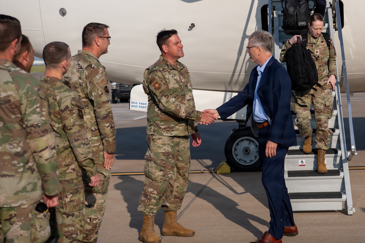 U.S. Air Force Col. Joseph D. Wall, 22nd Air Refueling Wing commander, welcomes Secretary of the Air Force Troy Meink to McConnell Air Force Base, Kansas, Aug. 12, 2026. Secretary Meink visited McConnell during a historic period as the 22nd Air Refueling Wing works toward completing its transition from the KC-135 Stratotanker to the KC-46A Pegasus. (U.S. Air Force photo by Airman Matthew Nguyen)