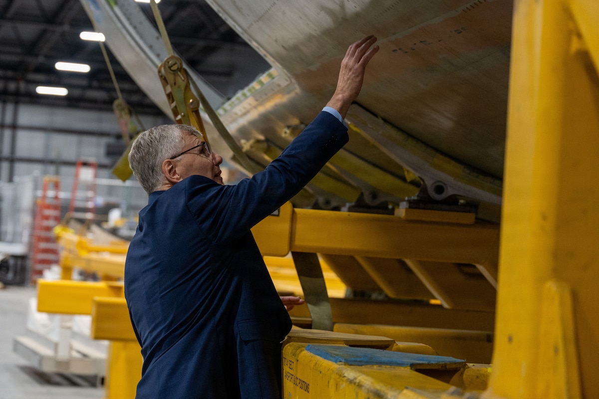 Secretary of the Air Force Troy Meink tours the National Institute for Aviation Research facility in Wichita, Kansas, Aug. 12, 2026. Secretary Meink met with aviation experts to learn more about the research and technology capabilities that help strengthen the nation’s aviation industry and support the future of airpower. (U.S. Air Force photo by Airman Daniel Obi)