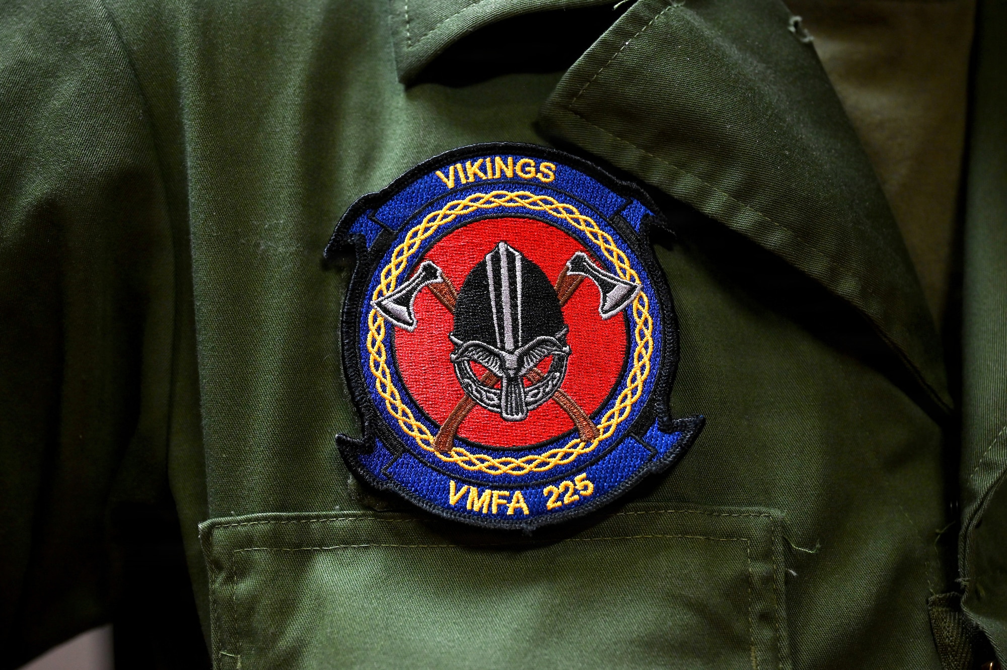 U.S. Marine Corps Pfc. Braden Curtis, Marine Fighter Attack Squadron 225 flight equipment technician, wears a VMFA 225 patch during RED FLAG-Alaska 26-3 at Eielson Air Force Base, Alaska, Aug. 19, 2026.