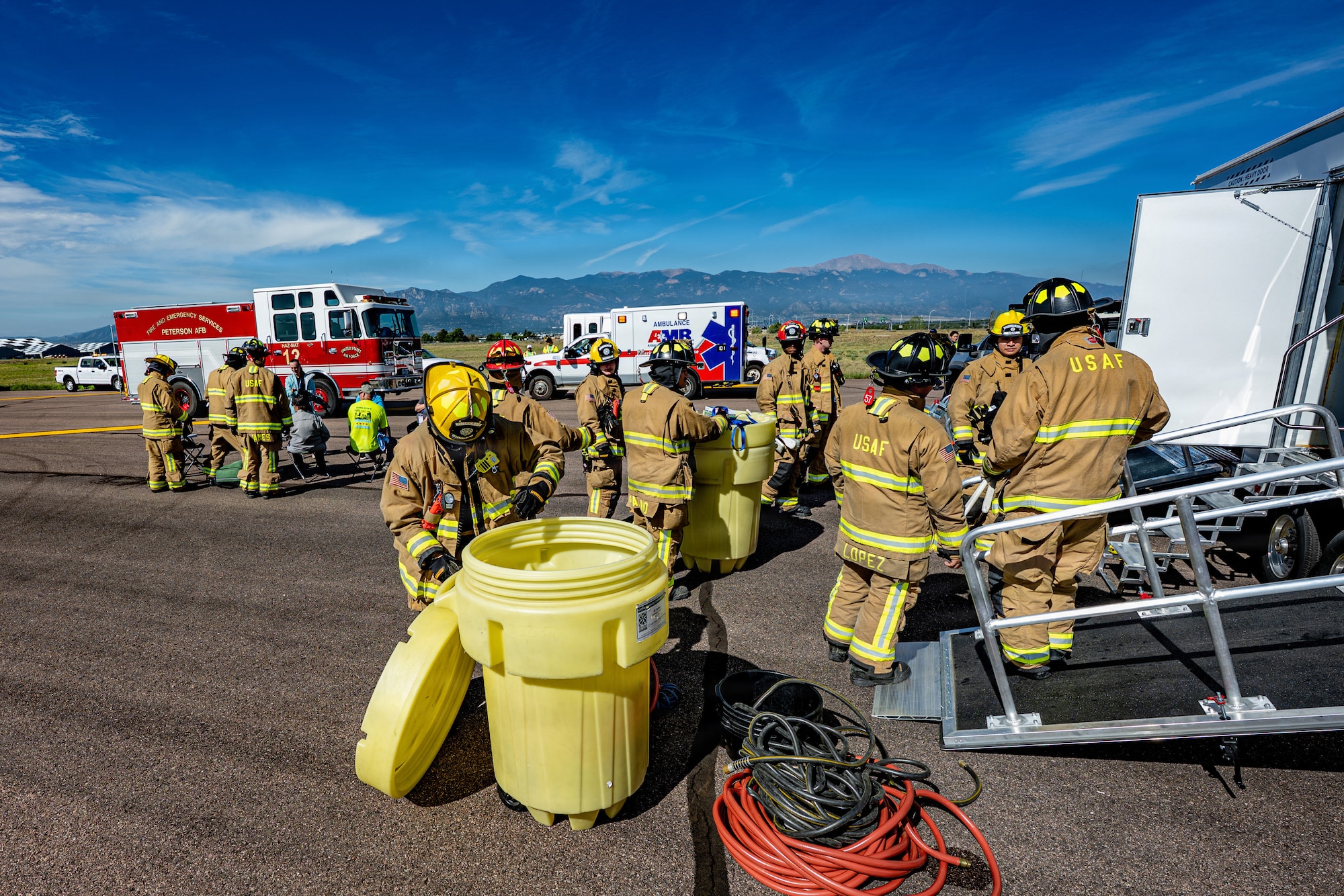 Firefighters assigned to the 21st Civil Engineer Squadron coordinate emergency response operations