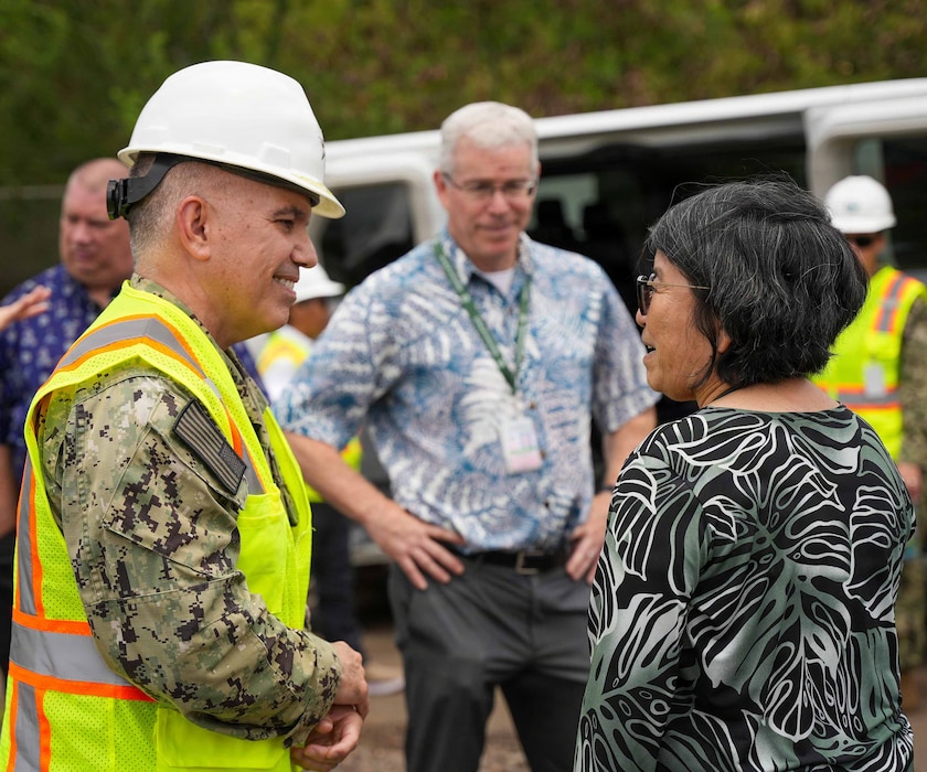 Rear Adm. Lester Ortiz, deputy commander, Navy Closure Task Force-Red Hill (NCTF-RH), speaks with Kathy Ho, deputy director for environmental health, Hawaii Department of Health, during a site visit to the Red Hill Bulk Fuel Storage Facility (RHBFSF) in Honolulu, Aug. 4, 2026. Charged with the safe decommissioning of the RHBFSF, NCTF-RH was established by the Department of the Navy as a commitment to the community and the environment. NCTF-RH continues to engage with the people of Hawaii, regulatory agencies, and other stakeholders as it safely and deliberately decommissions the facility. (U.S. Navy photo by Mass Communication Specialist 1st Class Glenn Slaughter)