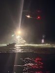 A Coast Guard Air Station San Francisco MH-65 Dolphin helicopter crew hovers over the motor vessel Lake Bay, a 58-foot fishing vessel, during a search and rescue case near Point Reyes, California, Aug. 21, 2026. Coast Guard crews responded to a distress call after Lake Bay’s crew ran aground and entered a surf zone near Ten Mile Beach off Point Reyes. (U.S. Coast Guard photo courtesy Station Bodega Bay)