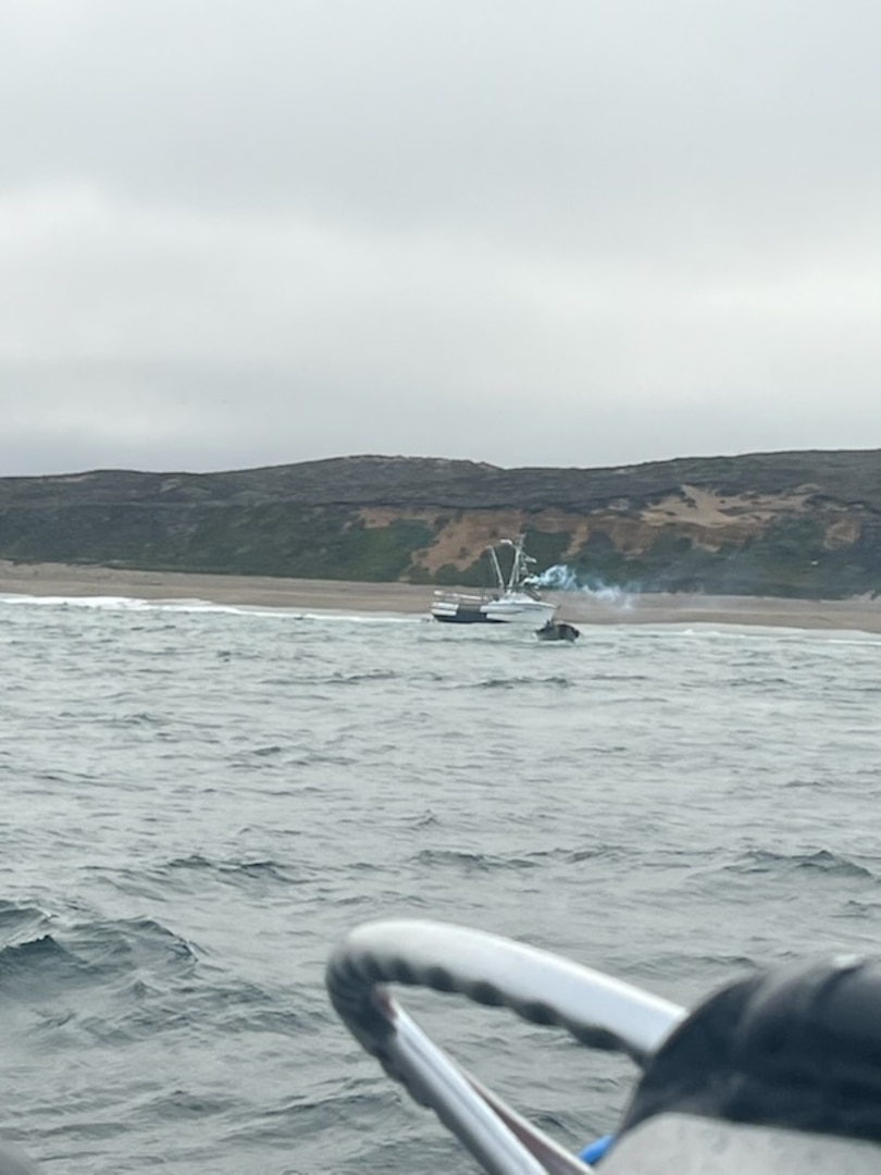 A Coast Guard Station Golden Gate 47-foot Motor Lifeboat crew monitors the motor vessel Lake Bay’s captain maneuvering a skiff away from the shoreline during a search and rescue case off Ten Mile Beach near Point Reyes, California, Aug. 21, 2026. Coast Guard crews from Station Bodega Bay, Station Golden Gate and Air Station San Francisco responded to a vessel aground and in the surf zone with five people aboard off Point Reyes. (U.S. Coast Guard photo courtesy Station Golden Gate)
