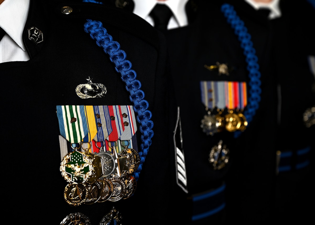 U.S. Space Force Honor Guard ceremonial guardsmen model the new Honor Guard ceremonial uniform at Joint Base Anacostia-Bolling, Washington, D.C., Aug. 21, 2026. The updated uniform features a distinct Space Force blue belt, cap, and rope over the left shoulder. 

(U.S. Air Force Photo by Senior Airman Shanel Toussaint)