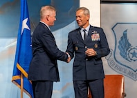 Air Force Chief of Staff Gen. Ken Wilsbach shakes the hand of AFRC commander, Lt. Gen. Paul Fast