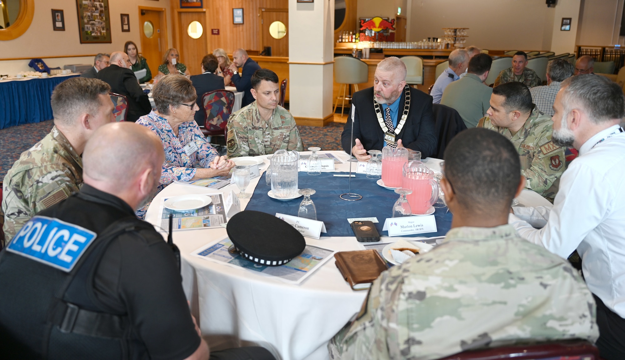 Team Mildenhall leadership, local civic leaders and key service providers from Suffolk, Norfolk and Cambridgeshire converse during the Key Leaders Engagement Day at RAF Mildenhall, England, Aug. 20, 2026. The guests viewed base facilities, engaged with Team Mildenhall Airmen and civilians, and saw advanced military assets which execute our global mission every day. (U.S. Air Force photo by Karen Abeyasekere)