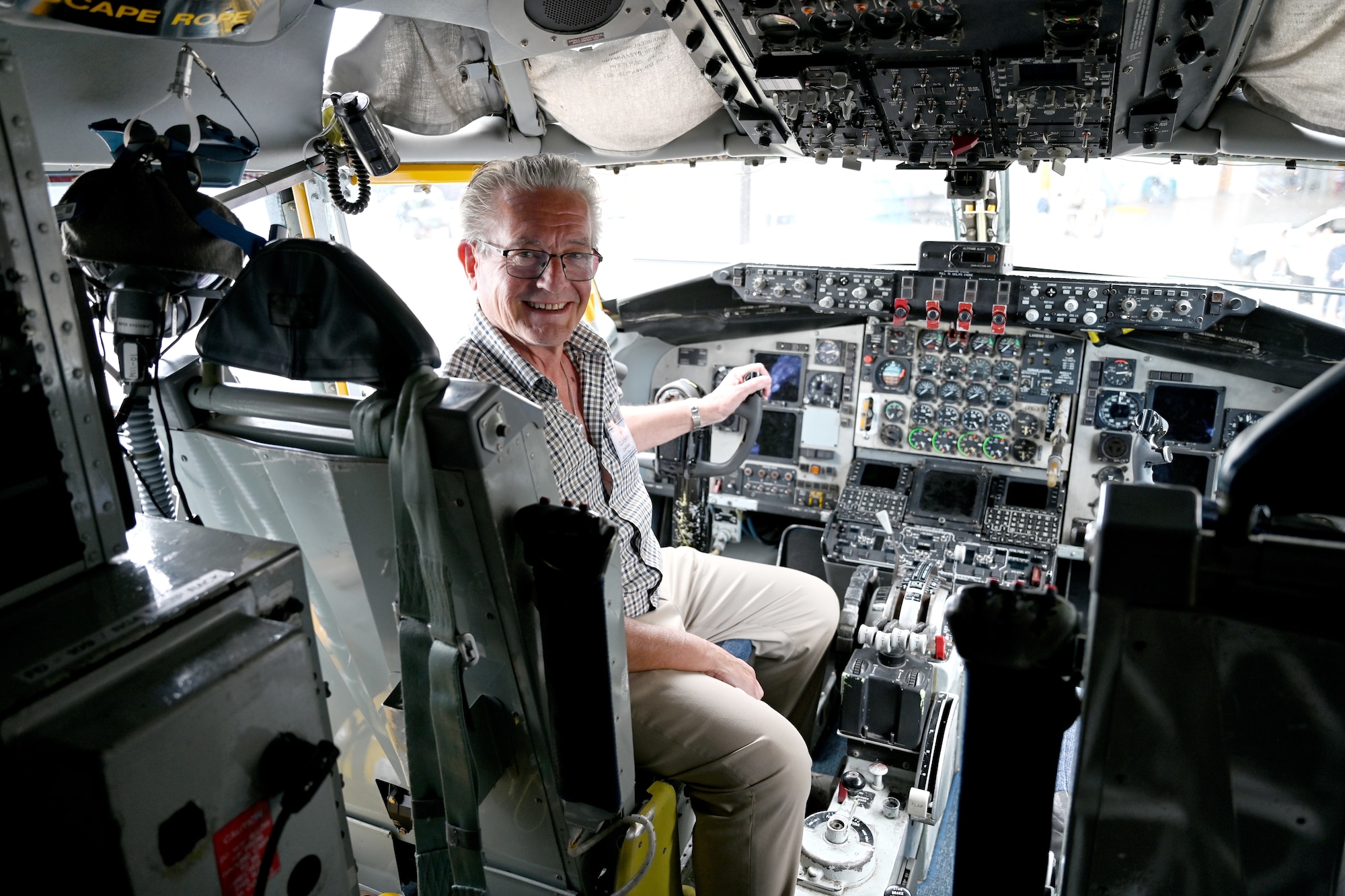 Councillor Nick Smith, Lakenheath Parish Council chairman, takes a close-up look at the cockpit of a KC-135 Stratotanker during the Key Leaders Engagement Day at RAF Mildenhall, England, Aug. 20, 2026. Local civic leaders and key service providers from Suffolk, Norfolk and Cambridgeshire viewed base facilities, engaged with Team Mildenhall Airmen and civilians, and saw advanced military assets which execute our global mission every day. (U.S. Air Force photo by Karen Abeyasekere)