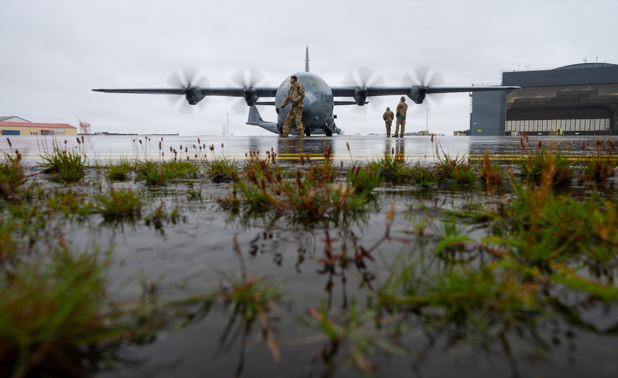 U.S. Air Force Airmen assigned to the 37th Airlift Squadron, 86th Operations Support Squadron and 86th Aircraft Maintenance Squadron, prepare a C-130J Super Hercules aircraft for a flight supporting exercise Northern Viking 26 at Keflavík Air Base, Iceland