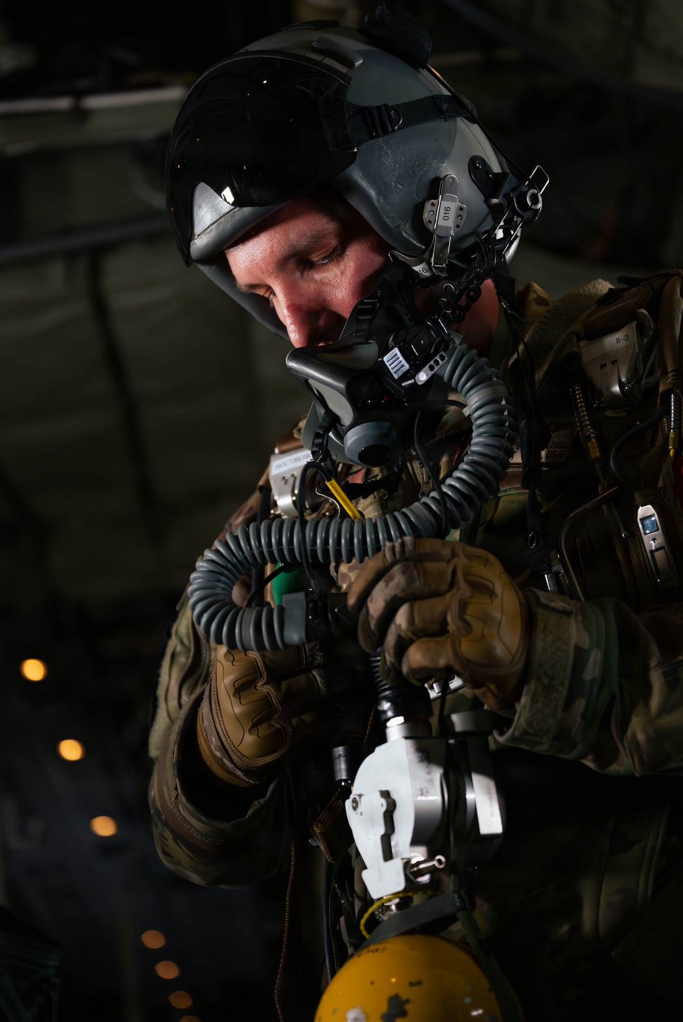 U.S. Air Force Master Sgt. Alexander Lauher, 86th Operations Support Squadron wing tactics flight chief, checks flight equipment during a mission supporting exercise Northern Viking 26 at Keflavík Air Base, Iceland