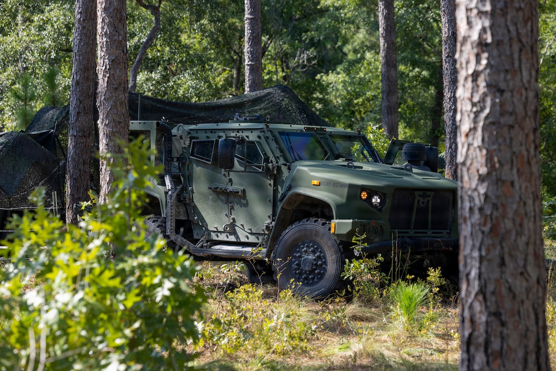 A joint light tactical vehicle is staged during an 8th Engineer Support Battalion Marine Corps combat readiness evaluation at Marine Corps Base Camp Lejeune, North Carolina, August 20, 2026. The MCCRE is a formal evaluation system and was conducted by 8th ESB to assess the battalion’s combat readiness and ensure standardization in training and operational capabilities. (U.S. Marine Corps photo by Lance Cpl. Isabella Ramos)