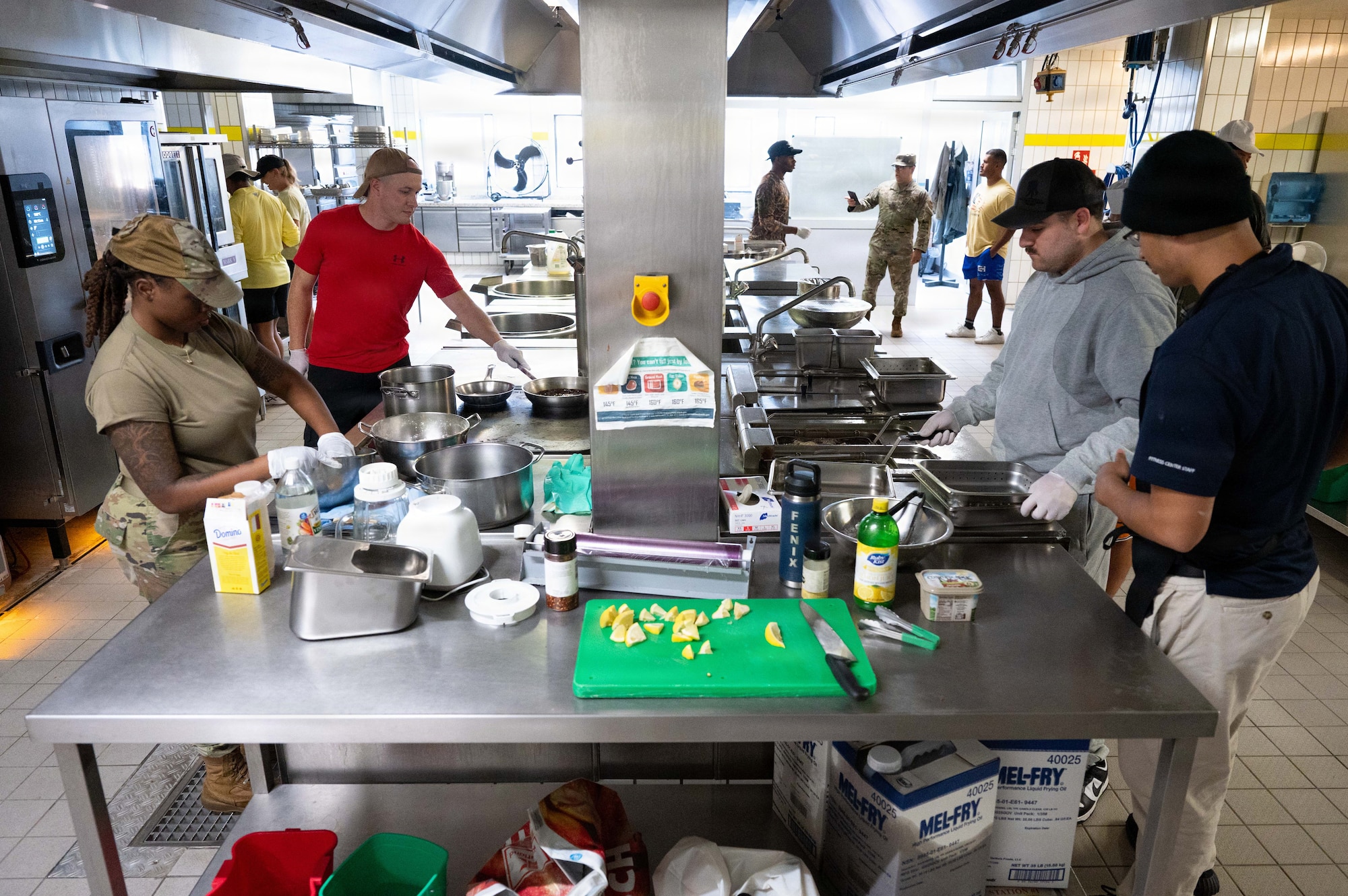 Kaiserslautern Military Community competitors prepare meals during the 786th Force Support Squadron Wing Wars competition at Kapaun Air Station, Germany, Aug. 19, 2026.