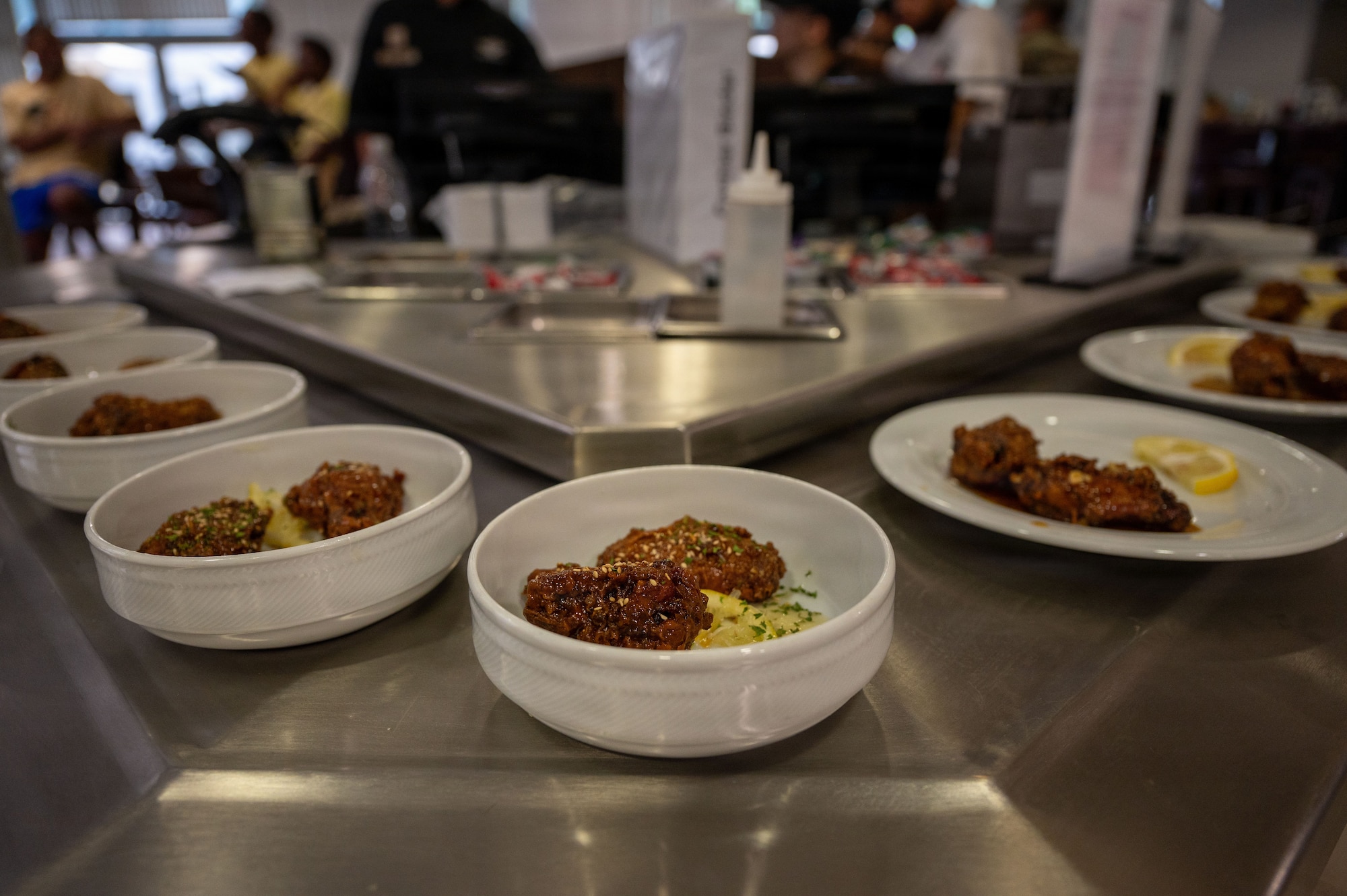 Kaiserslautern Military Community competitors prepare to judge individual dishes during the 786th Force Support Squadron Wing Wars competition at Kapaun Air Station, Germany, Aug. 19, 2026.