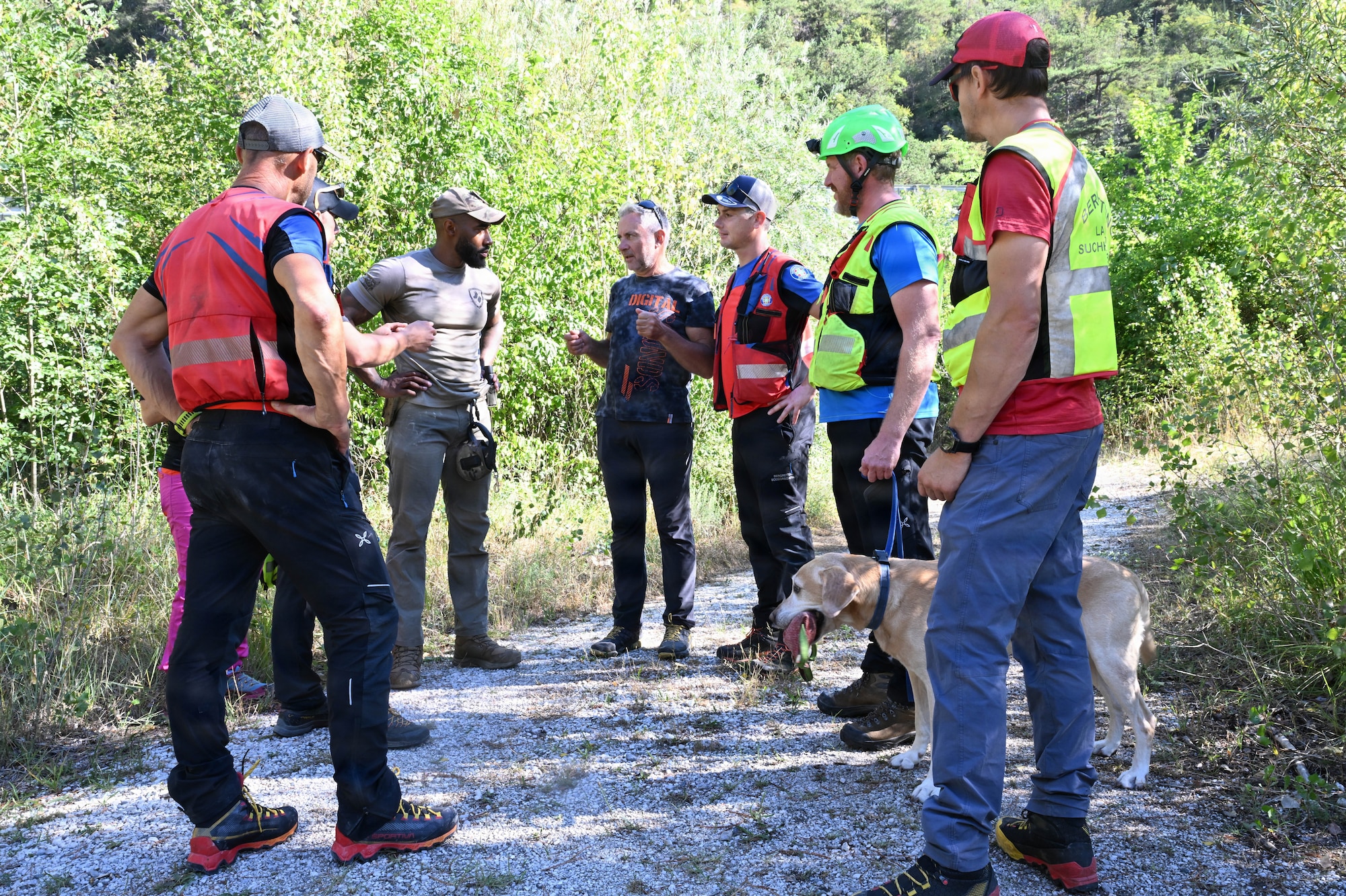 K-9 trainers debriefs after training.