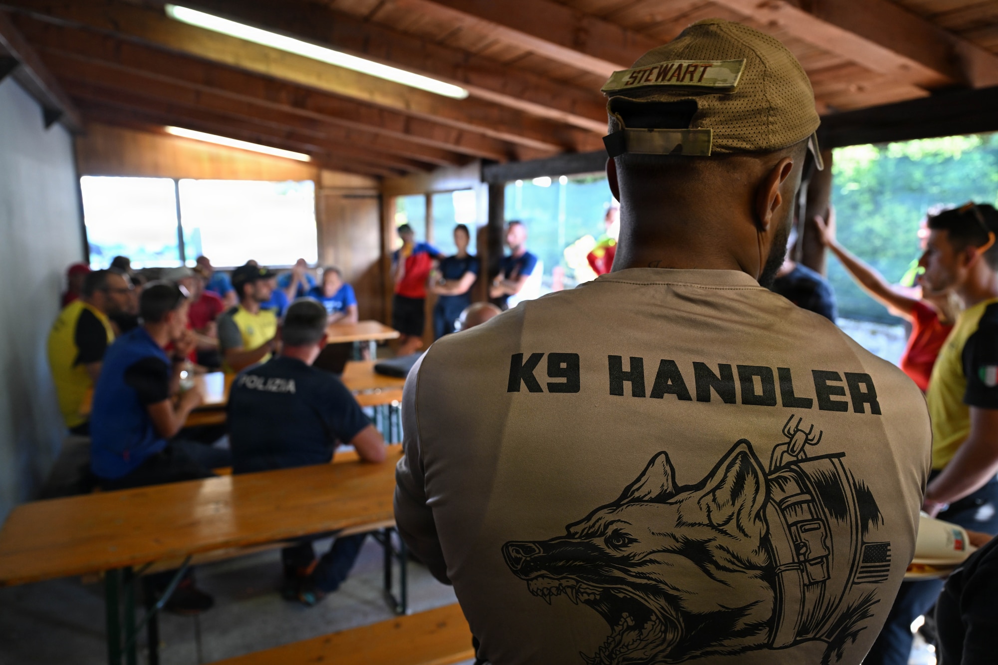 K-9 trainer attends briefing.