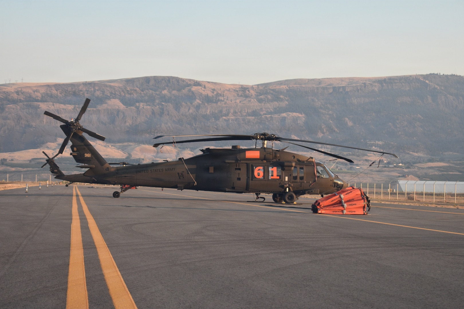 A UH-60 Black Hawk Helicopter sits outside of Army Aviation Support Facility 2 at Pangborn Memorial Airport, East Wenatchee, Wash., August 16, 2026.